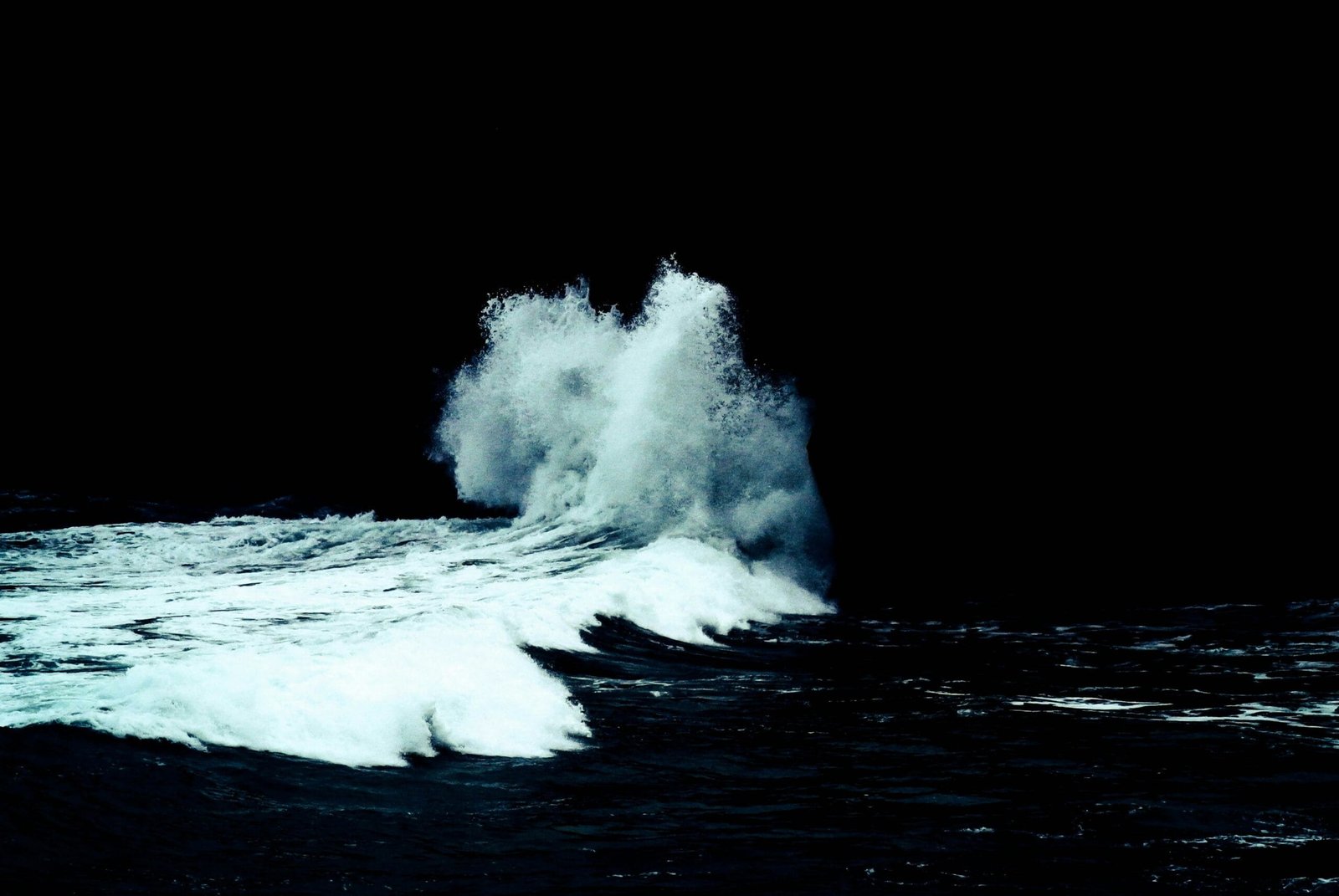 seawater crashing on shore